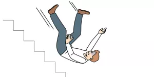 Mann stürzt von einer Treppe